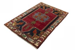 Corner detail of 2000s Shiraz rug showing border pattern and Wool pile