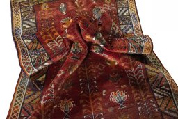 Corner detail of 2000s Shiraz rug showing border pattern and Wool pile