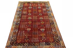 Surface texture of 2000s Shiraz rug with natural Wool and intricate pattern