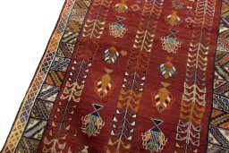 Backside of handmade 2000s Shiraz rug showing knot structure and weave density
