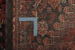 Close-up detail of 2000s Shiraz rug from Iran / Persia showing Wool weave