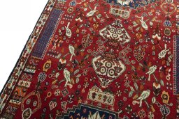 Backside of handmade 2000s Shiraz rug showing knot structure and weave density