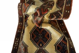 Corner detail of 2000s Shiraz rug showing border pattern and Wool pile