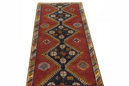 Surface texture of 2000s Shiraz rug with natural Wool and intricate pattern
