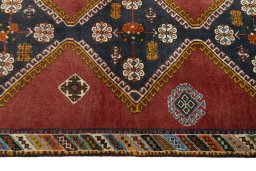 Close-up detail of 2000s Shiraz rug from Iran / Persia showing Wool weave