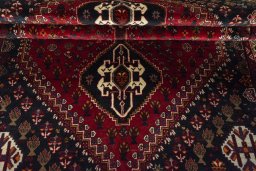 Close-up detail of 2000s Shiraz rug from Iran / Persia showing Wool weave