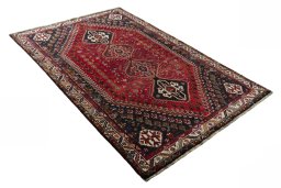 Close-up detail of 2000s Shiraz rug from Iran / Persia showing Wool weave