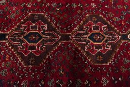 Central medallion detail of 2000s Shiraz rug from Iran / Persia