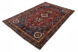 Corner detail of 2000s Shiraz rug showing border pattern and Wool pile
