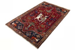 Corner detail of 2000s Shiraz rug showing border pattern and Wool pile