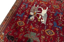 Backside of handmade 2000s Shiraz rug showing knot structure and weave density