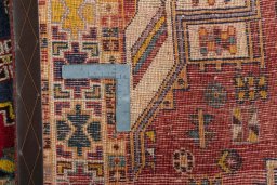 Surface texture of 2000s Shiraz rug with natural Wool and intricate pattern