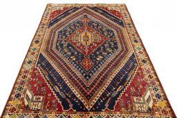 Surface texture of 2000s Shiraz rug with natural Wool and intricate pattern