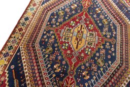 Backside of handmade 2000s Shiraz rug showing knot structure and weave density