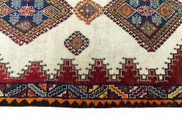 Close-up detail of 2000s Shiraz rug from Iran / Persia showing Wool weave