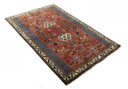 Close-up detail of 2000s Shiraz rug from Iran / Persia showing Wool weave