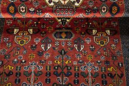 Full view of 2000s Shiraz rug from Iran / Persia, 202 × 132 cm in Red tones