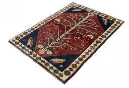 Corner detail of 2000s Shiraz rug showing border pattern and Wool pile