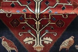 Full view of 2000s Shiraz rug from Iran / Persia, 180 × 128 cm in Red tones