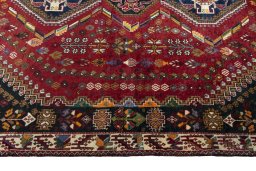 Close-up detail of 2000s Shiraz rug from Iran / Persia showing Wool weave