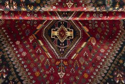 Full view of 2000s Shiraz rug from Iran / Persia, 259 × 172 cm in Red tones