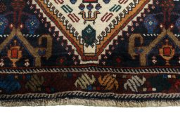 Close-up detail of 2000s Shiraz rug from Iran / Persia showing Wool weave