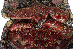 Close-up detail of 2000s Shiraz rug from Iran / Persia showing Wool weave