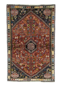 Full view of 2000s Shiraz rug from Iran / Persia, 171 × 110 cm in Red tones