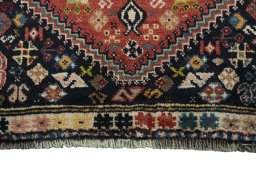 Close-up detail of 2000s Shiraz rug from Iran / Persia showing Wool weave