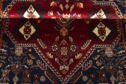 Corner detail of 2000s Shiraz rug showing border pattern and Wool pile