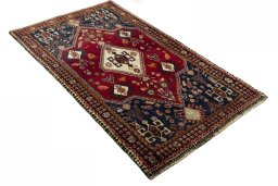 Close-up detail of 2000s Shiraz rug from Iran / Persia showing Wool weave