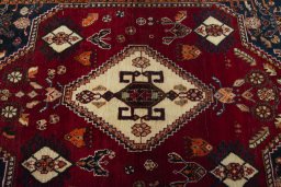 Central medallion detail of 2000s Shiraz rug from Iran / Persia