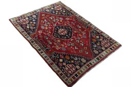 Close-up detail of 2000s Shiraz rug from Iran / Persia showing Wool weave