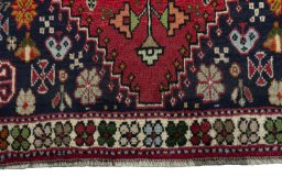 Close-up detail of 2000s Shiraz rug from Iran / Persia showing Wool weave