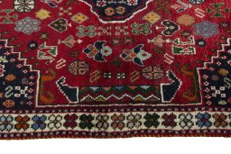 Full view of 2000s Shiraz rug from Iran / Persia, 146 × 105 cm in Red tones
