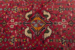 Central medallion detail of 2000s Shiraz rug from Iran / Persia