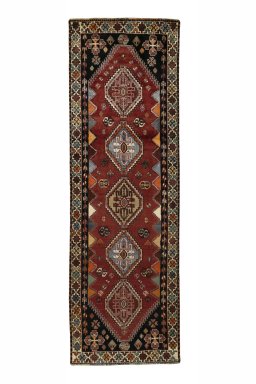 Full view of 2000s Shiraz rug from Iran / Persia, 273 × 87 cm in Red tones