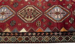 Close-up detail of 2000s Shiraz rug from Iran / Persia showing Wool weave