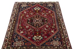 Surface texture of 2000s Shiraz rug with natural Wool and intricate pattern