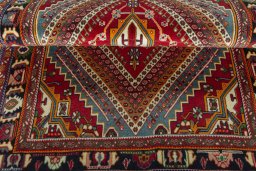 Corner detail of 1970s Shiraz rug showing border pattern and Wool pile