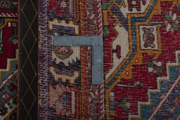 Surface texture of 1970s Shiraz rug with natural Wool and intricate pattern
