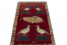 Surface texture of 2000s Shiraz rug with natural Wool and intricate pattern