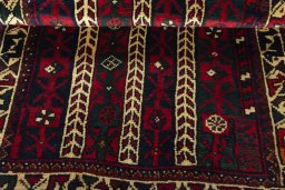 Full view of 2000s Shiraz rug from Iran / Persia, 116 × 72 cm in Red tones