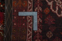 Surface texture of 1970s Shiraz rug with natural Wool and intricate pattern