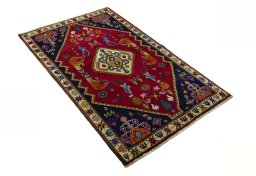Close-up detail of 2000s Shiraz rug from Iran / Persia showing Wool weave