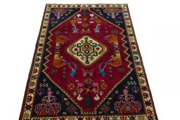 Surface texture of 2000s Shiraz rug with natural Wool and intricate pattern