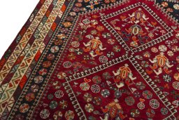 Backside of handmade 2000s Shiraz rug showing knot structure and weave density