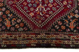Central medallion detail of 2000s Shiraz rug from Iran / Persia