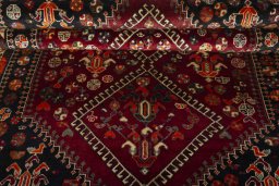 Full view of 2000s Shiraz rug from Iran / Persia, 222 × 157 cm in Red tones