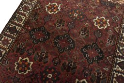 Backside of handmade 1970s Shiraz rug showing knot structure and weave density